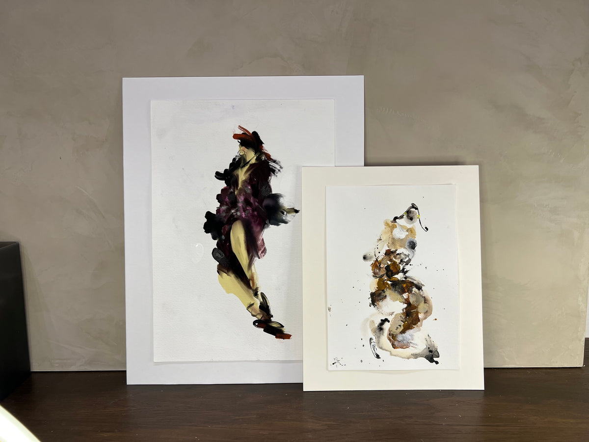 Two pieces of abstract art on a neutral background