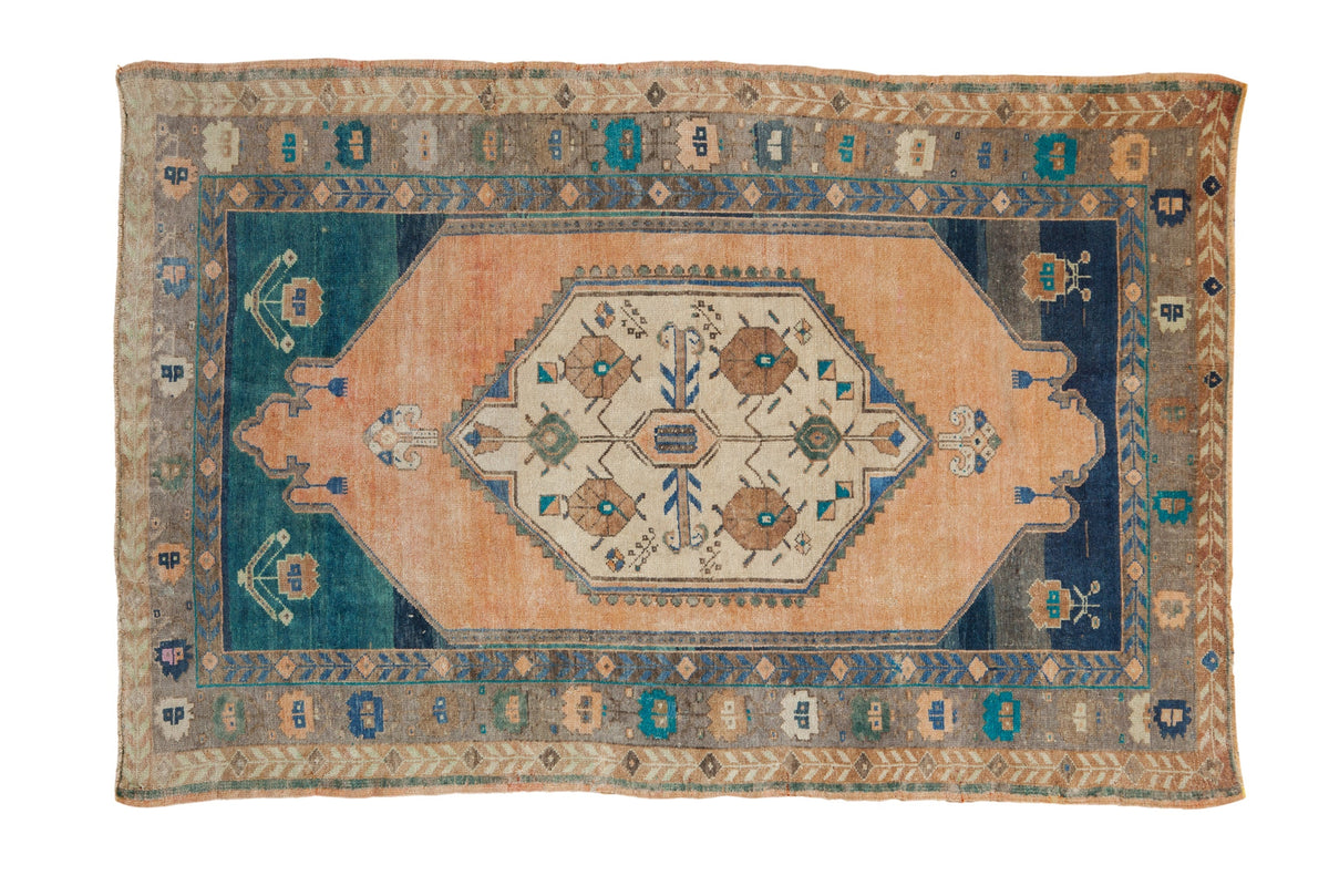 Decorative rug with geometric pattern on a white background