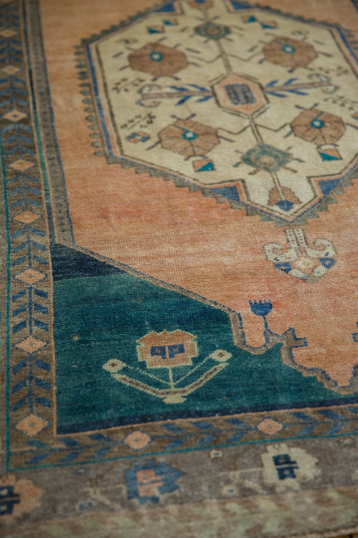 Close-up of a patterned rug with geometric designs