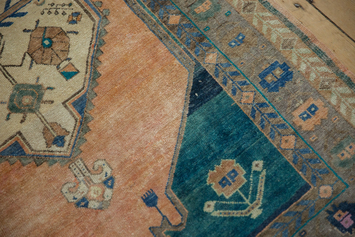 Close-up of a patterned rug with geometric designs.