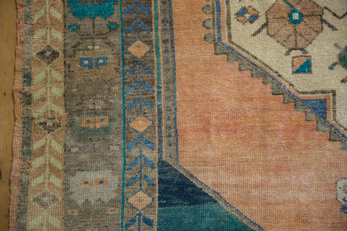 Close-up of a patterned rug with geometric designs.