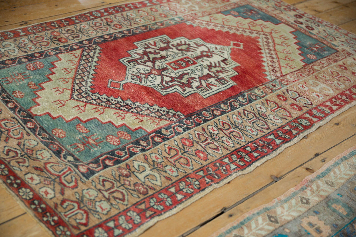 Vintage patterned rug on a wooden floor