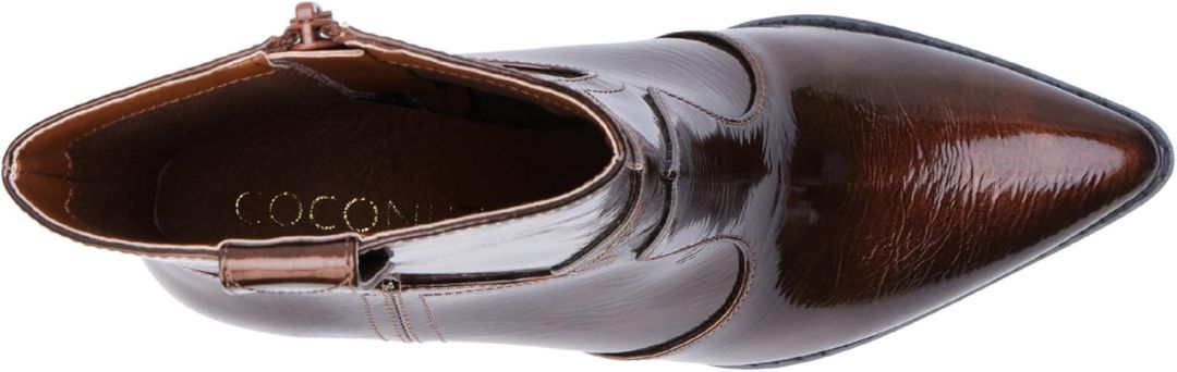 Brown pointed-toe shoe on a white background