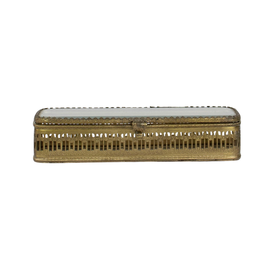 Gold rectangular box with a white interior on a white background