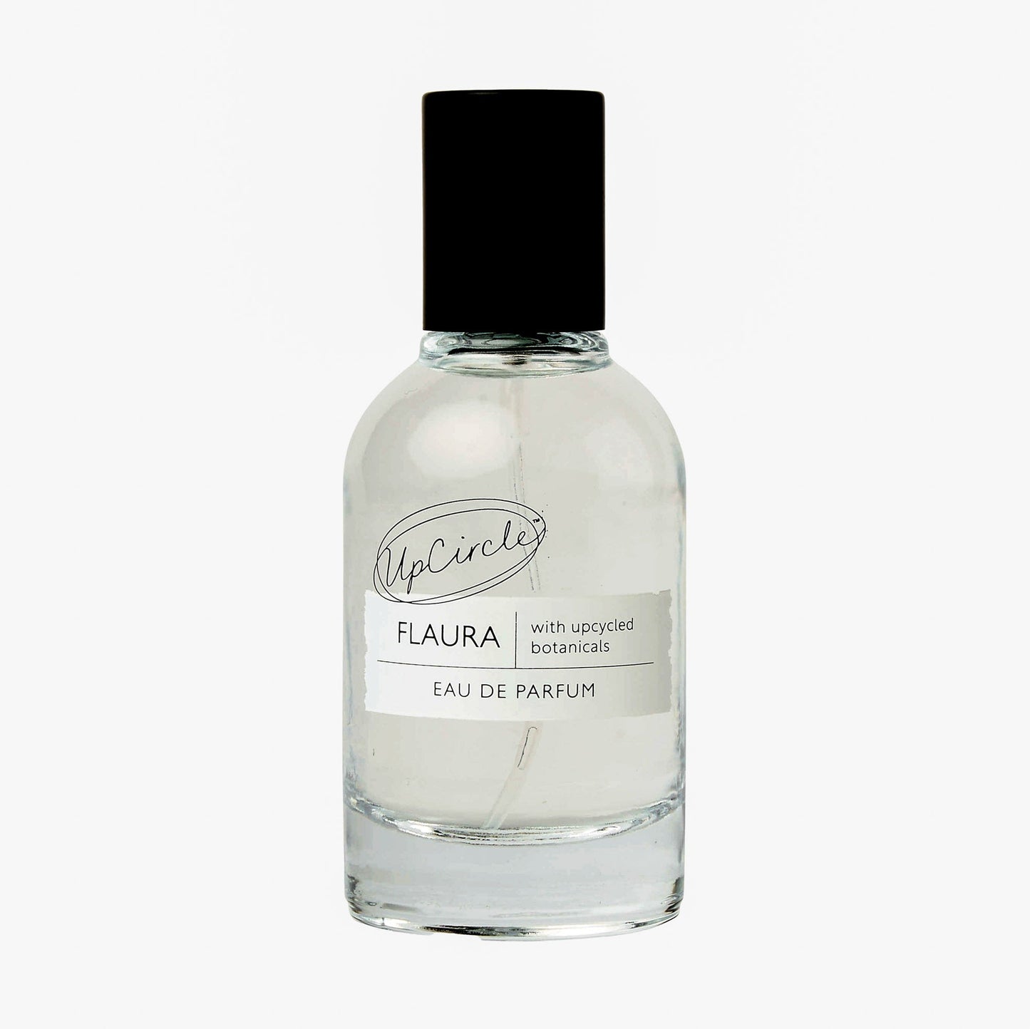 Clear glass perfume bottle with black cap on a white background