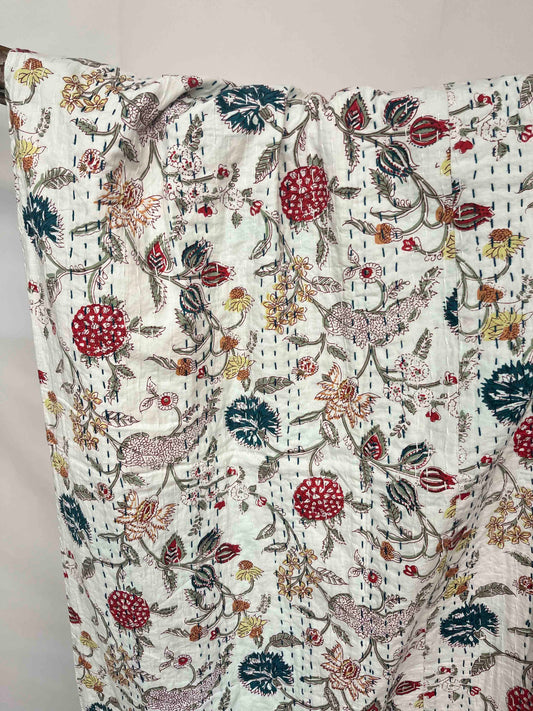 Floral patterned fabric with multicolor design on a plain background