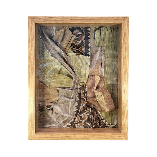 Framed textile art with a wooden frame on a white background