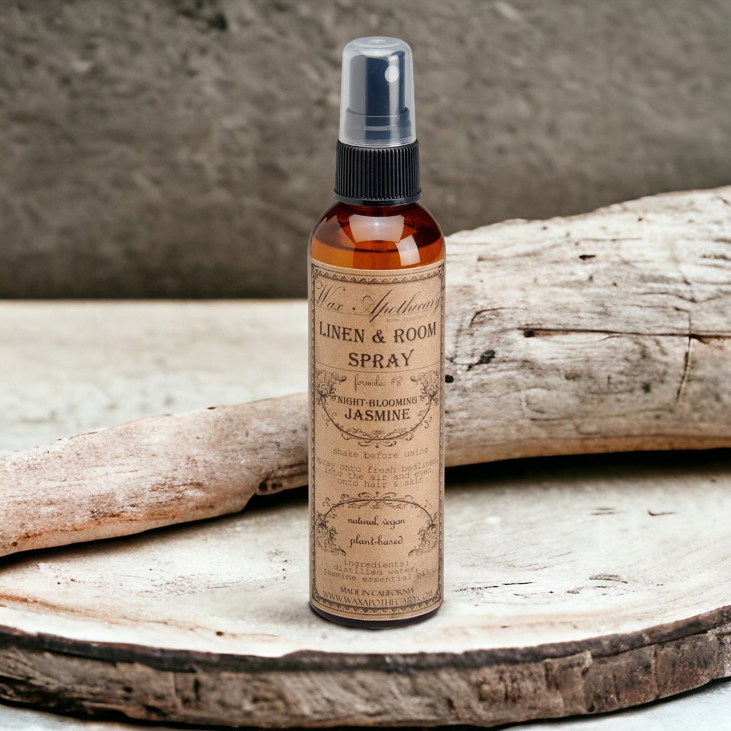 Linen & Room Spray bottle with vintage label on a wooden surface