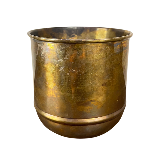 Brass planter on a white background
