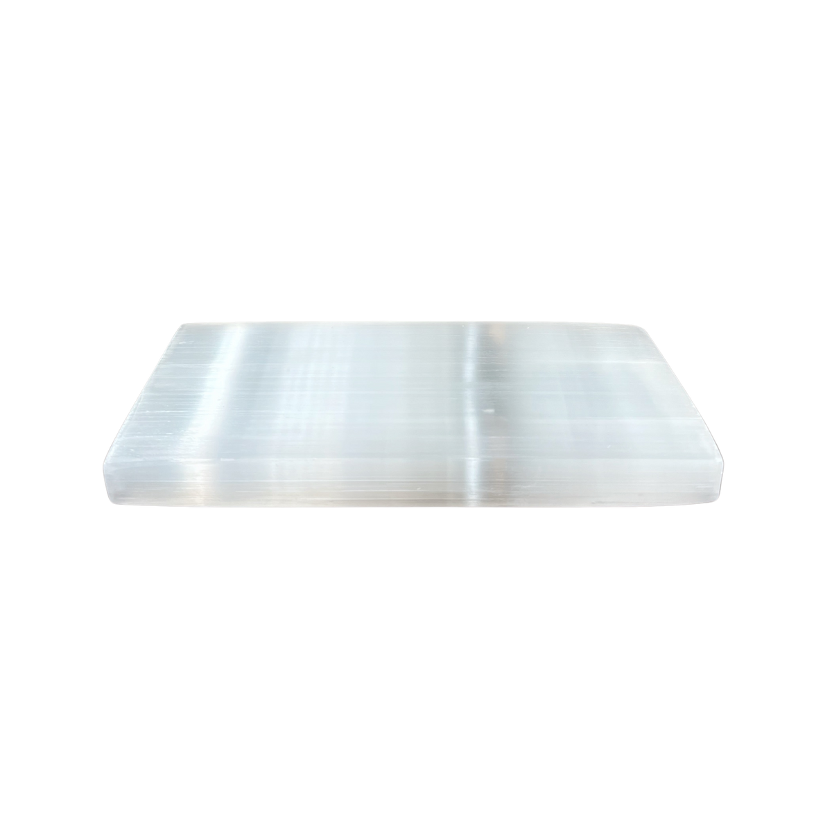 A rectangular white selenite crystal slab with smooth, polished edges and subtle horizontal striations, shown on a solid white background.