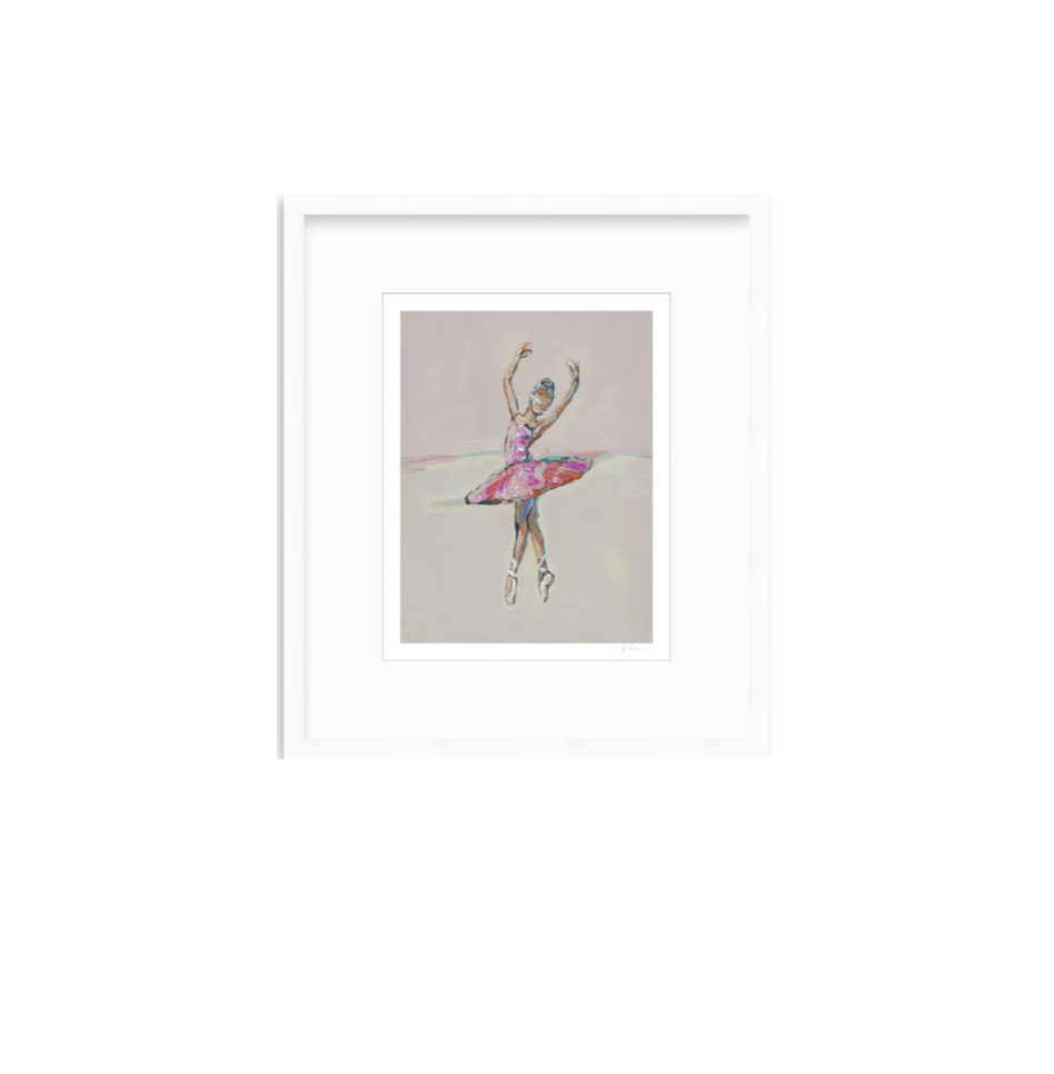 A framed art print featuring a pastel sketch of a ballerina in a pink tutu on a light gray background, presented in a white frame with a white mat.