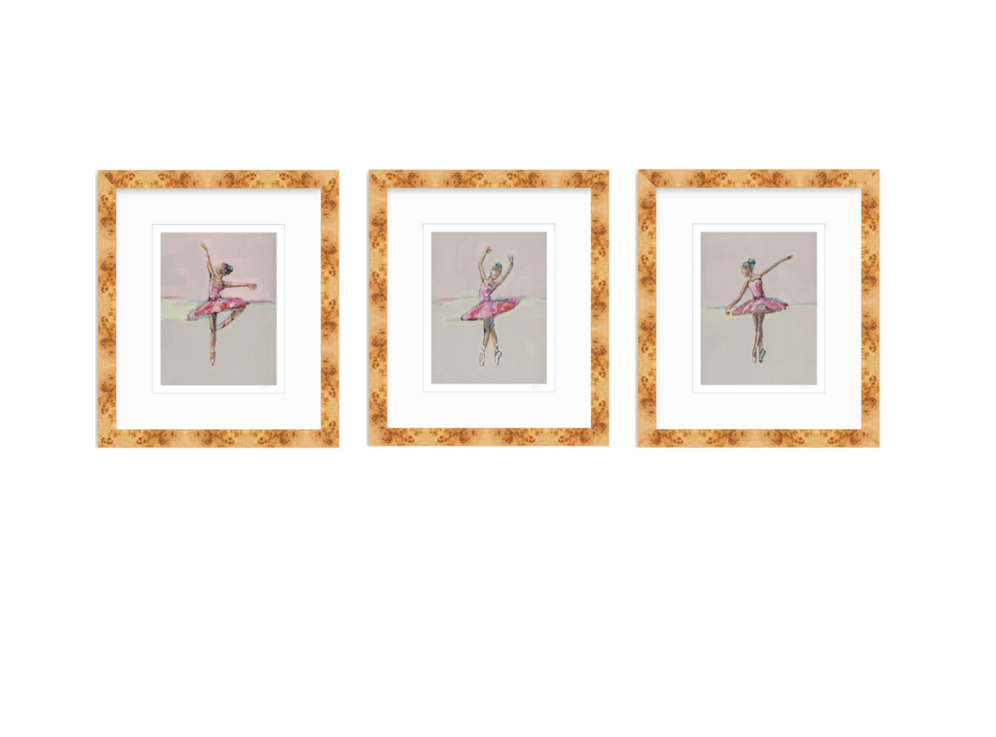 Three framed art prints featuring watercolor-style ballerina illustrations, arranged side by side on a white background. Each print has a white mat and a textured gold-brown floral frame.
