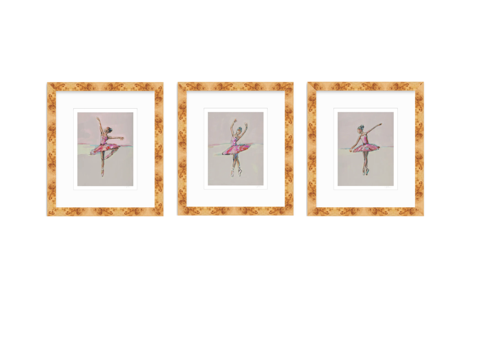 Three framed art prints featuring watercolor-style ballerina illustrations, arranged side by side on a white background. Each print has a white mat and a textured gold-brown floral frame.
