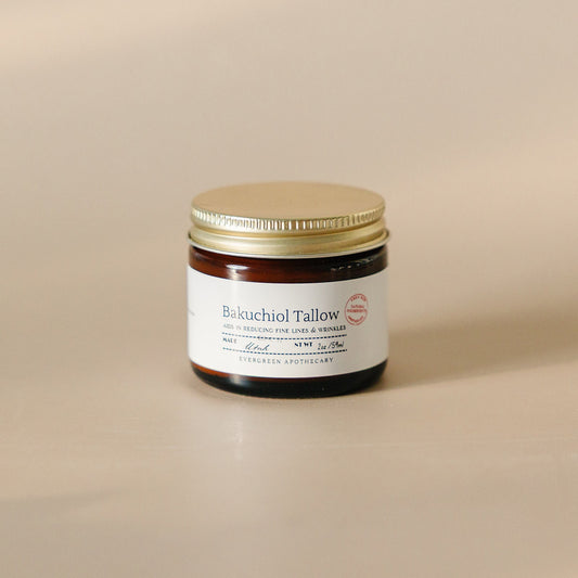 Jar of Bakuchiol Tallow on a beige background