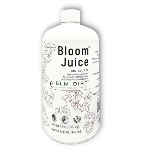 Bottle of Elm Dirt Bloom Juice on a white background