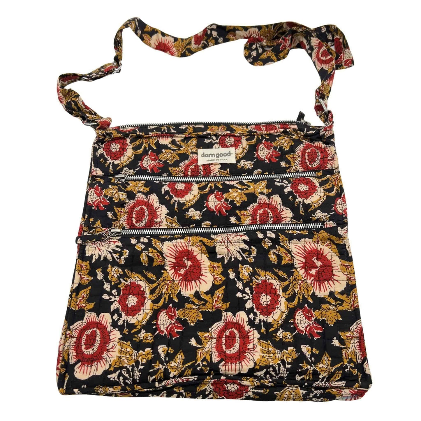 Floral patterned bag with a visible brand label on a white background