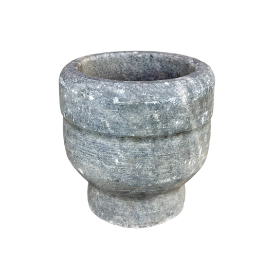Stone mortar on a white background