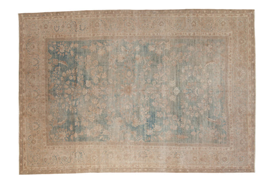 Decorative rug with intricate patterns on a plain background