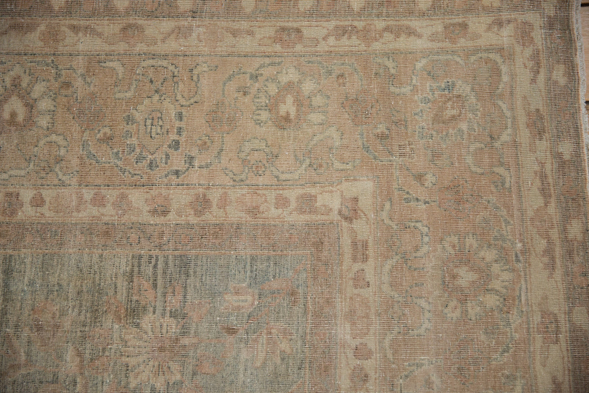 Close-up of an ornate rug with intricate patterns and colors.