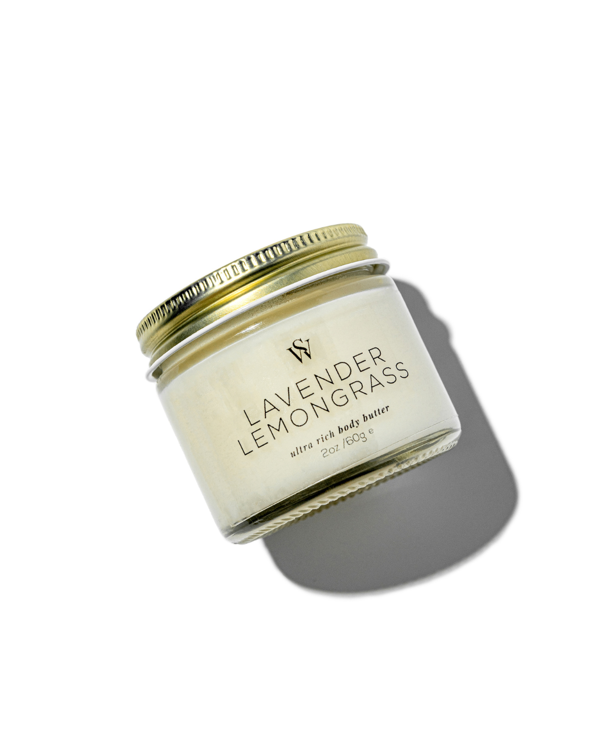 Jar of lavender lemongrass body butter on a white background