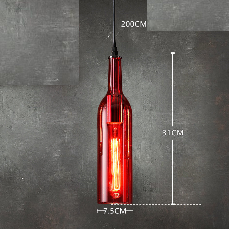 Red glass bottle pendant light with measurements on a dark gray background