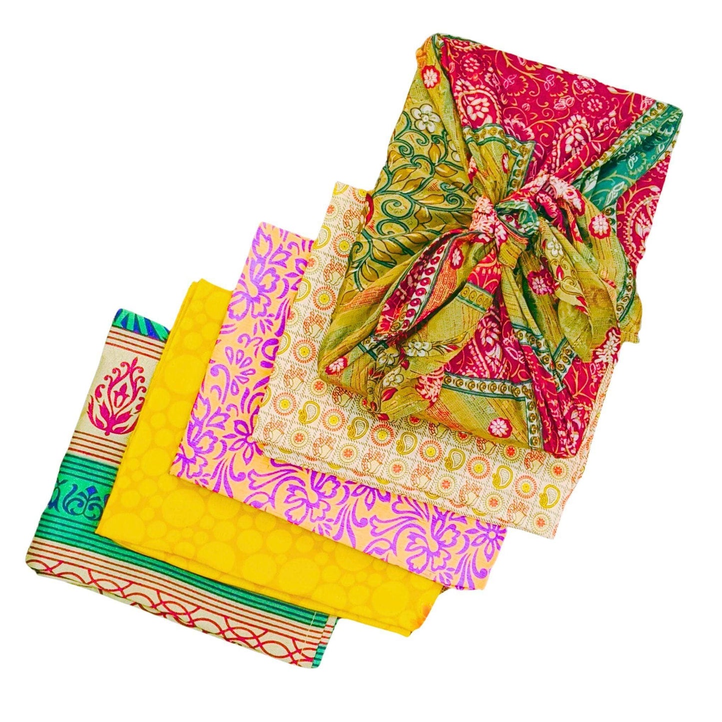 Colorful patterned fabric pieces on a white background